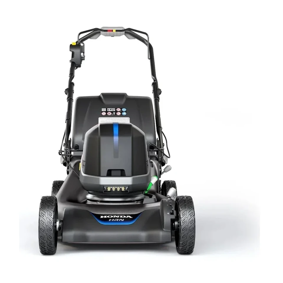 Honda HRN216VKA4 21 inch walk-behind lawn mower with rear grass bag on a residential lawn.