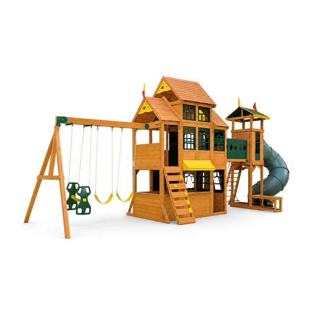 KidKraft Bear Cave Lodge large outdoor swing set playset standing on a backyard lawn