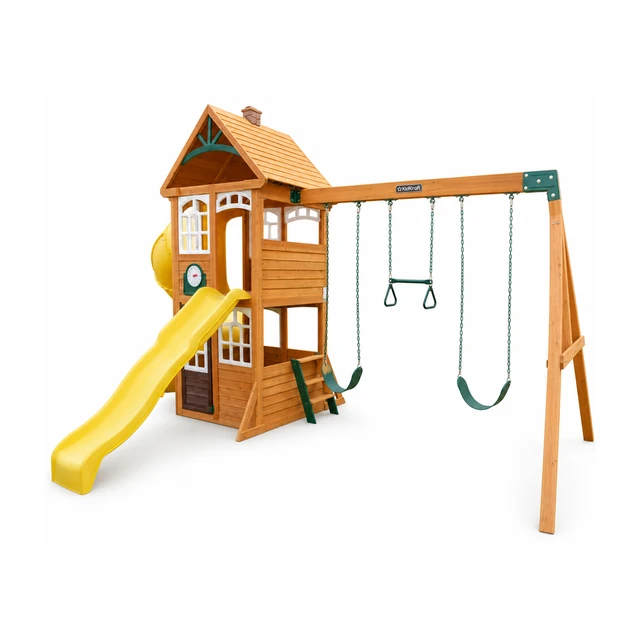KidKraft Castlewood outdoor swing set assembled on grass in a family backyard